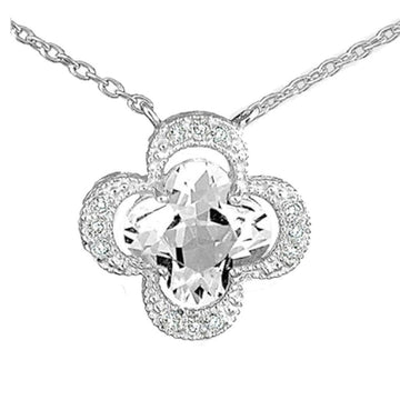 14k white gold clover pendant featuring a large white topaz and diamond accents.
