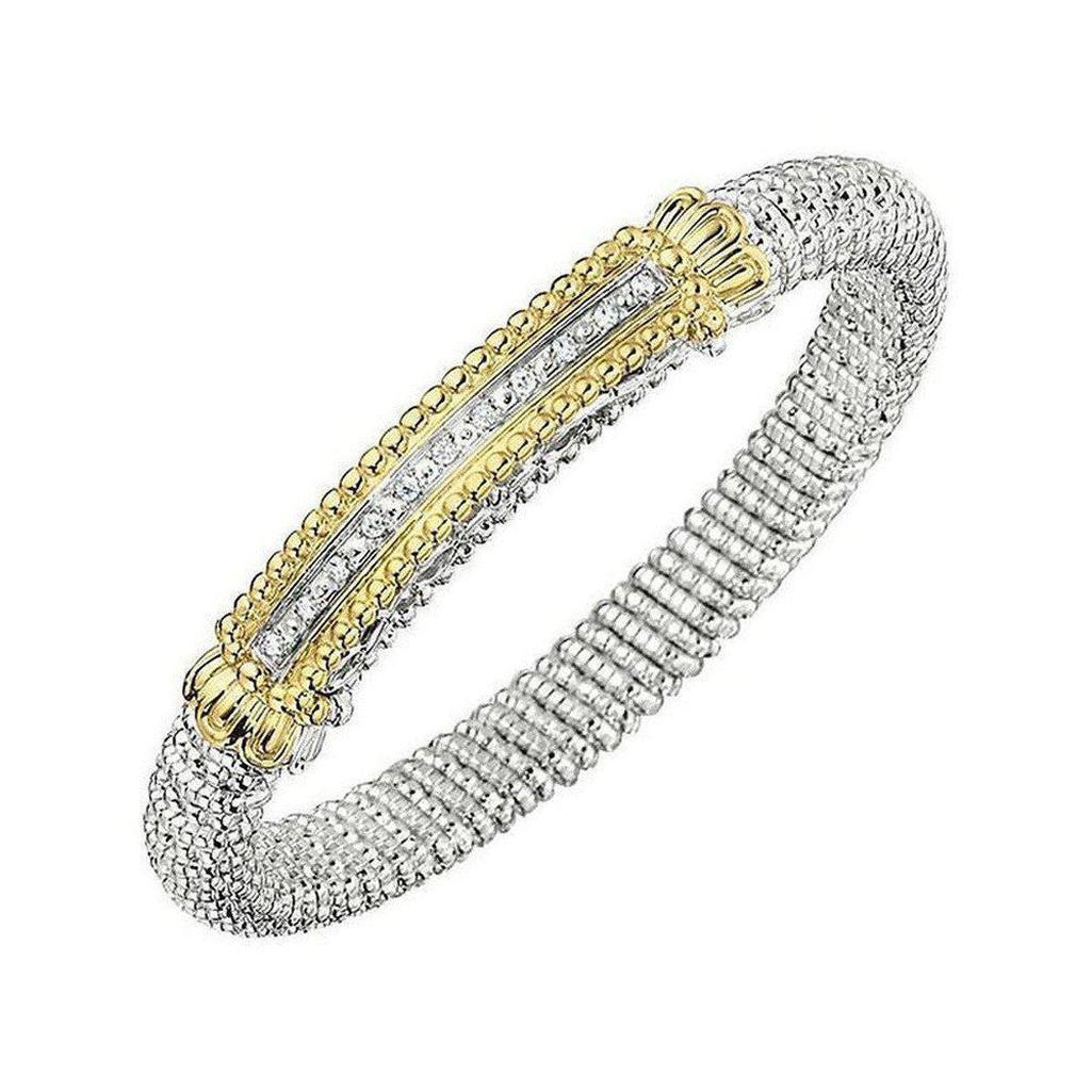 Diamond bar bracelet with gold and silver detailing, featuring a row of sparkling diamonds.
