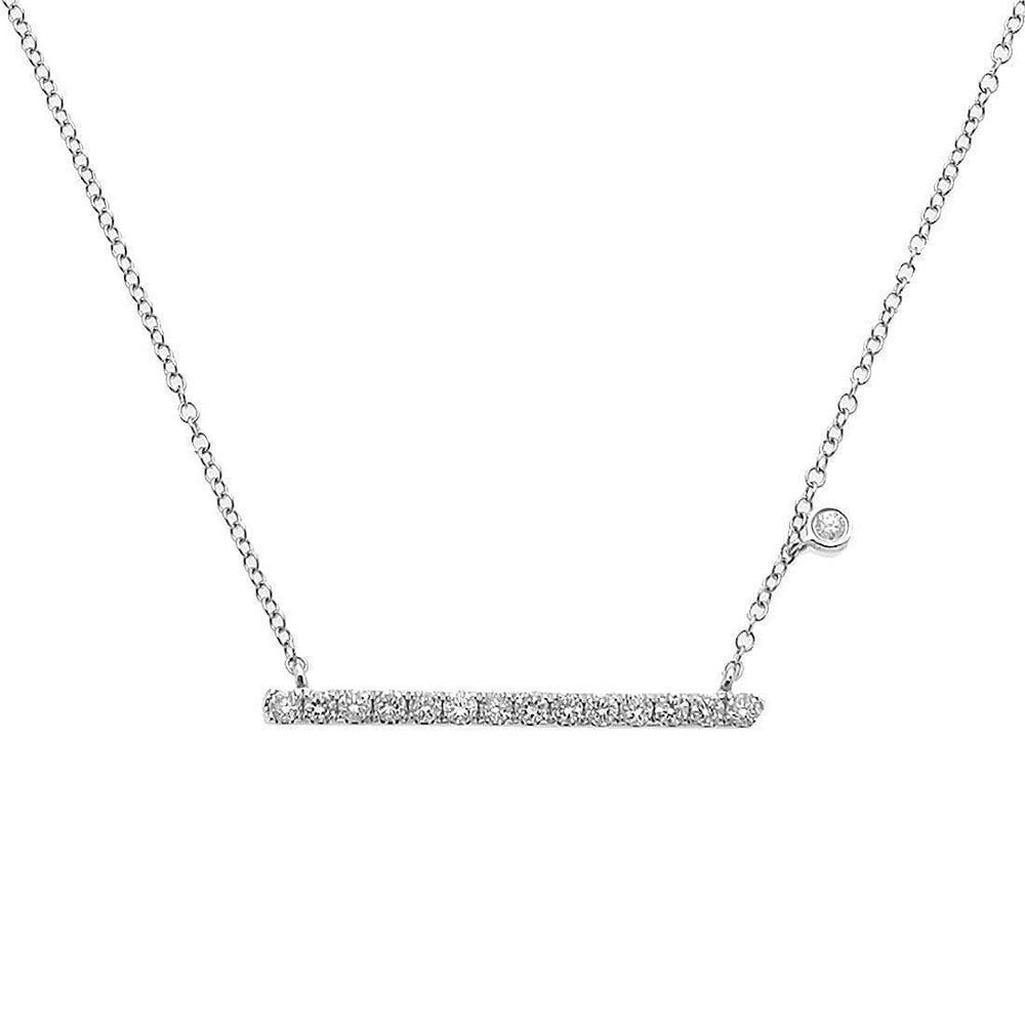 Diamond bar necklace with delicate chain and single diamond accent.
