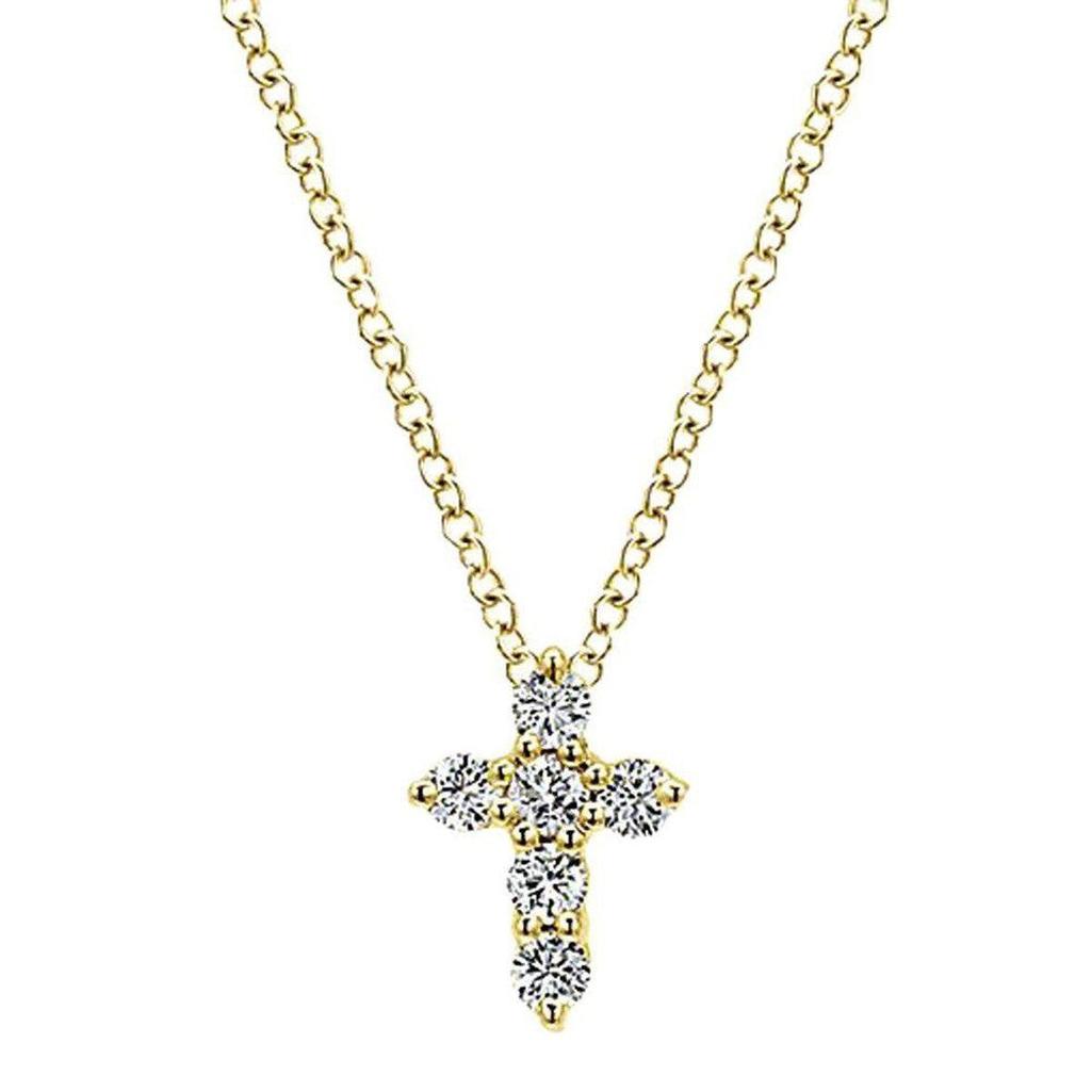 Dainty yellow gold diamond cross necklace
