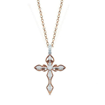 Diamond cross necklace in rose & white gold with delicate filigree detailing.
