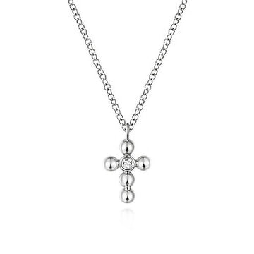 White gold diamond cross necklace with beaded detail.
