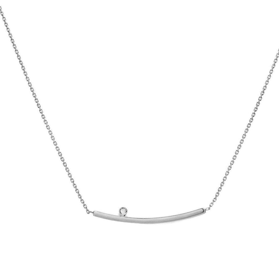 Silver curved bar necklace with a single diamond accent.
