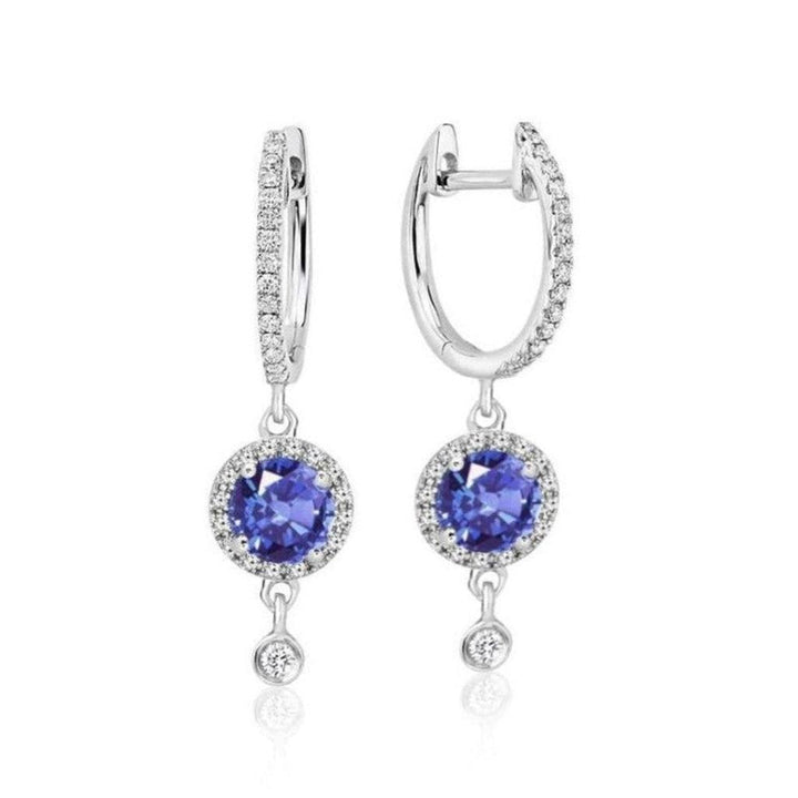 Diamond Huggie earrings with sapphire drops and diamond accents.
