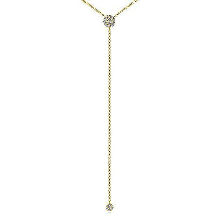 Gold diamond lariat necklace with two small pave diamond accents.
