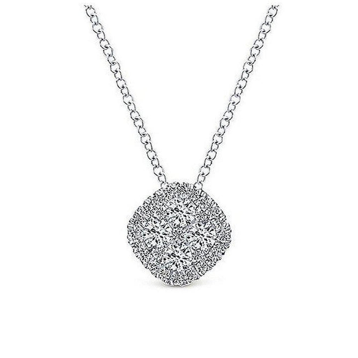 Elegant diamond pendant necklace featuring a cushion-cut cluster of shimmering diamonds.
