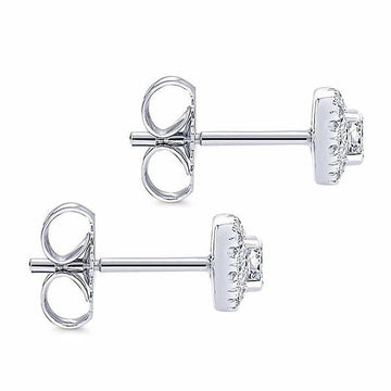 Elegant diamond stud earrings with halo setting, shown from two angles.
