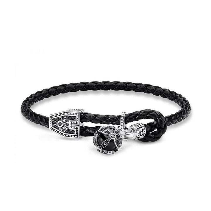 Black leather double wrap bracelet with silver ornate clasp and onyx charm.
