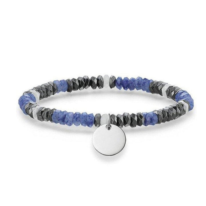 Engravable beaded bracelet with blue and black stones, silver charm.
