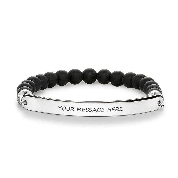 Black obsidian beaded bracelet with personalized silver bar.
