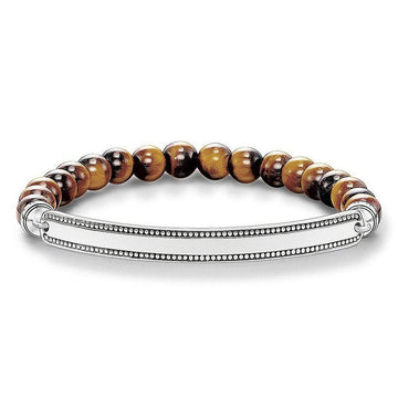 Engravable ID bracelet with tiger eye beads and sterling silver bar.
