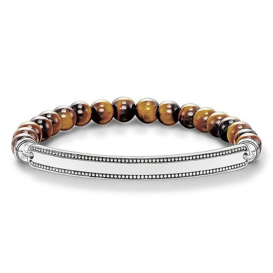 Engravable ID bracelet with tiger eye beads and sterling silver bar.
