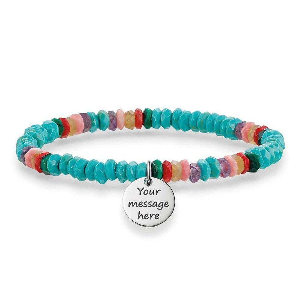 Engravable turquoise beaded bracelet with colorful accents & personalized silver charm.
