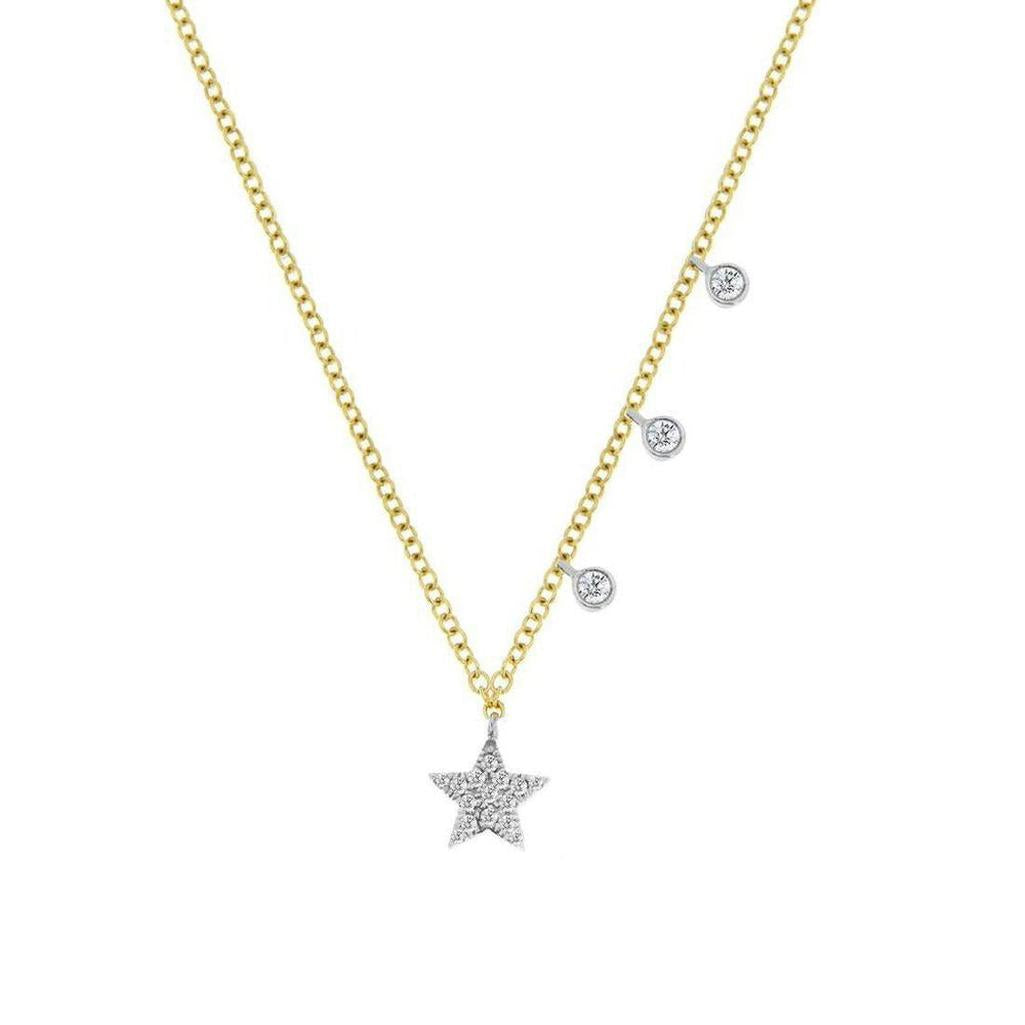 Yellow gold Essential Star necklace with diamond bezels and three diamond accents.
