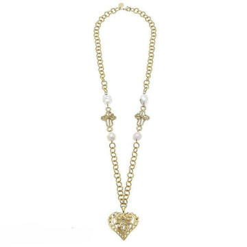 Gold chain necklace with filigree heart pendant and pearl accents.
