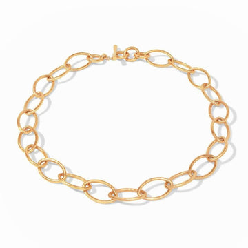 Gold chain necklace with textured oval links;  hammered finish.
