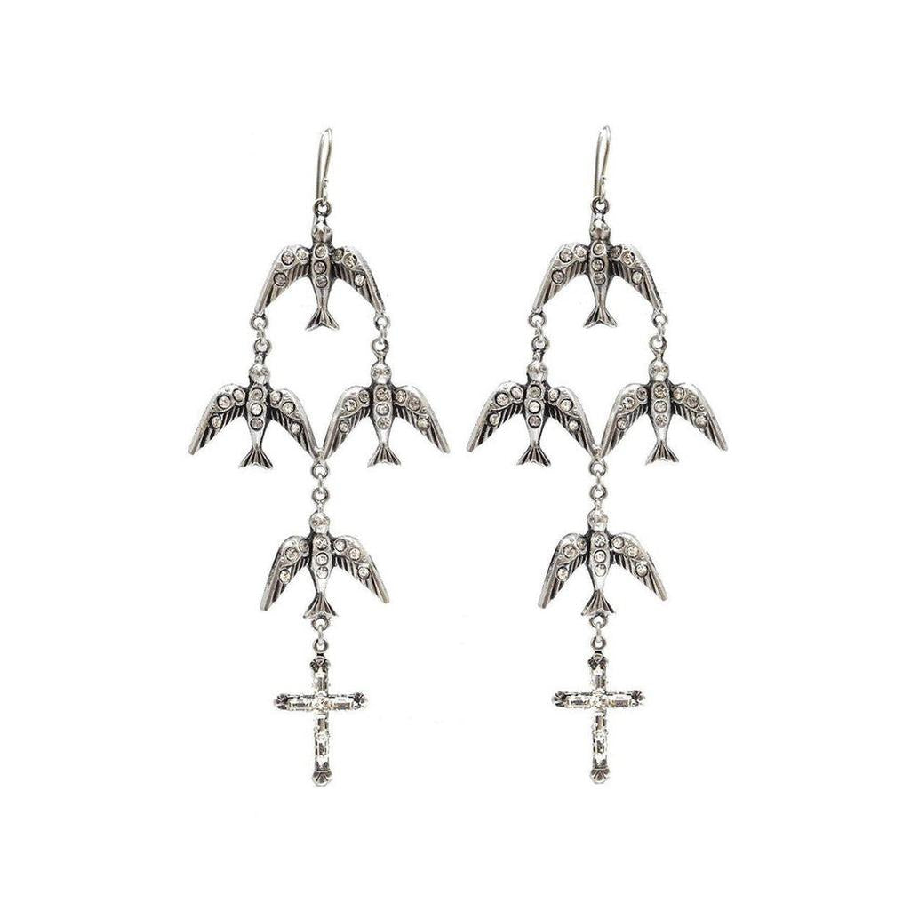 Flock of Aves earrings: Silver tone, crystal-accented birds & cross detail.
