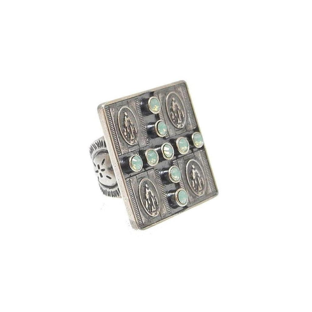 Silver Four Virgins Ring with green opal accents.
