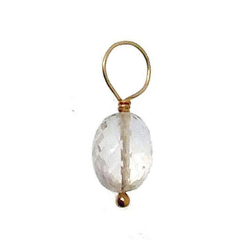 Clear quartz gemstone pendant with gold wire accents.
