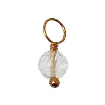 Clear quartz charm with gold wire and bead accents
