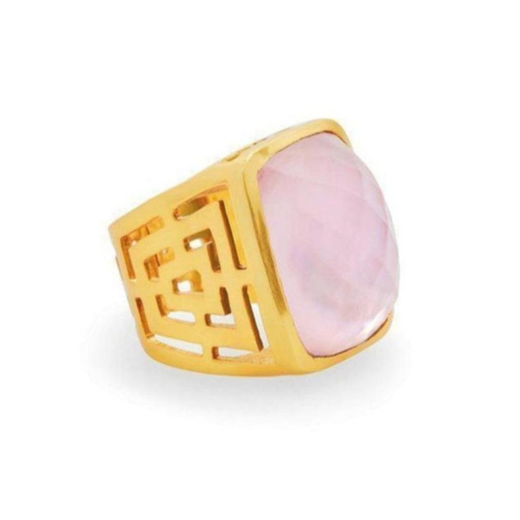 Geneva statement ring: Gold band, pink gemstone, Greek key design.
