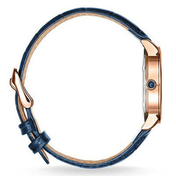 Rose gold watch with a blue leather band, shown in profile view.
