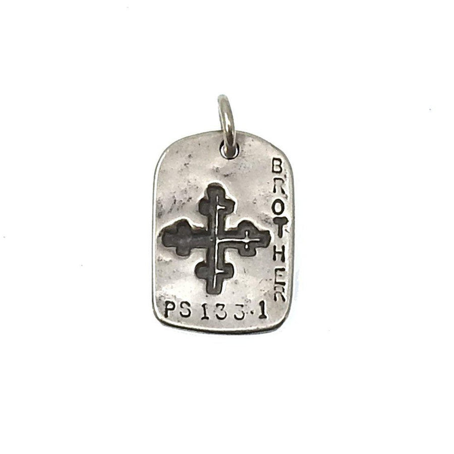 Silver God Tag Brother pendant featuring a cross and Psalm 133:1.
