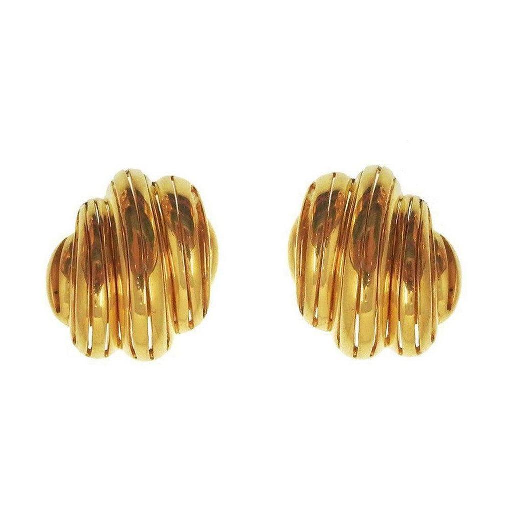 Gold button clip earrings with layered, textured design.
