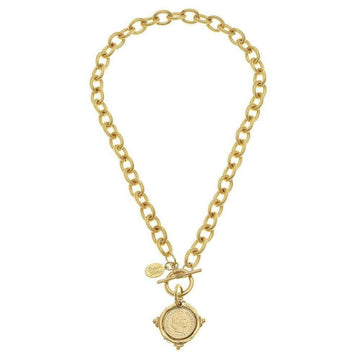 Gold coin pendant necklace with textured chain; features a toggle clasp.
