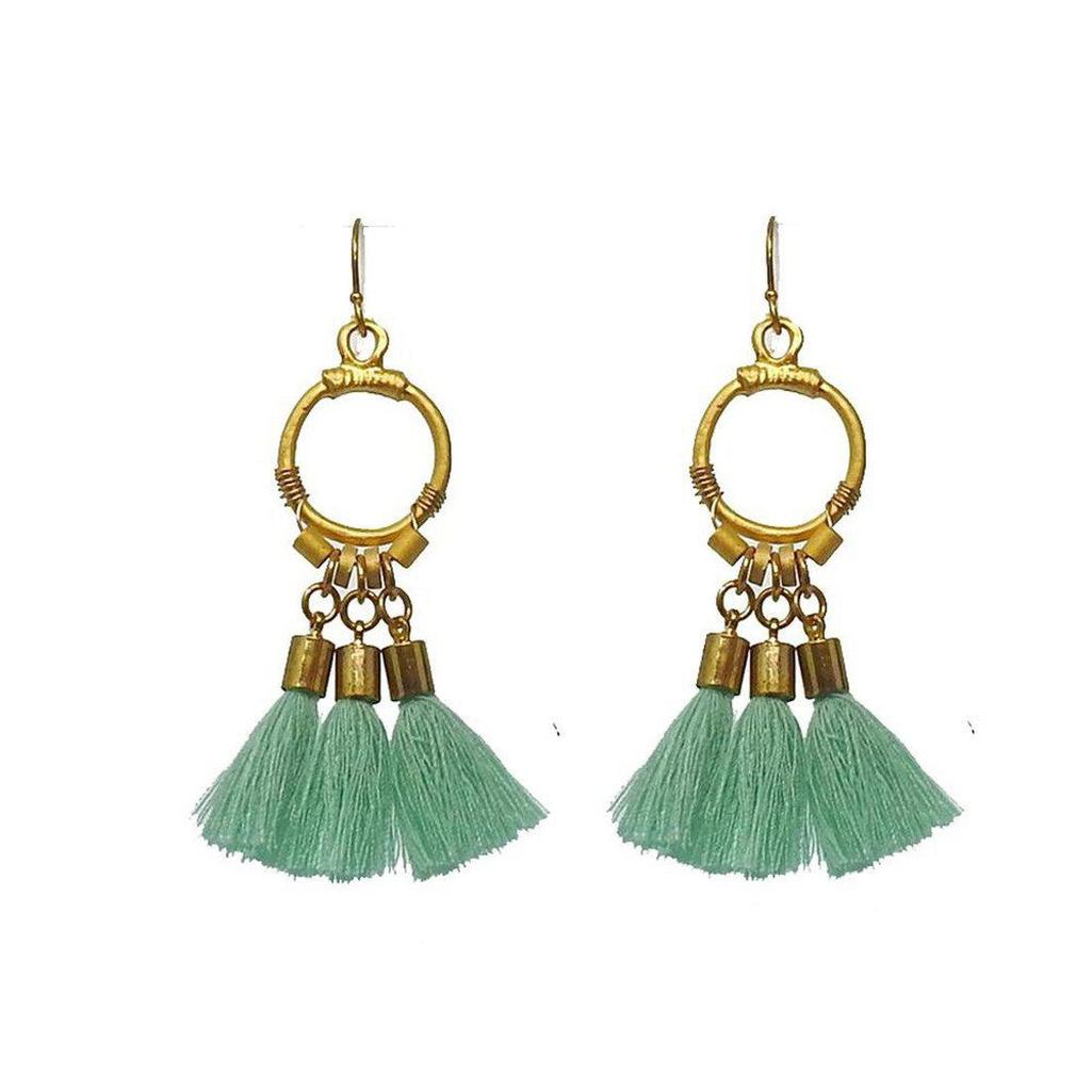 Gold dangle tassel earrings with mint green tassels and gold circular accents.
