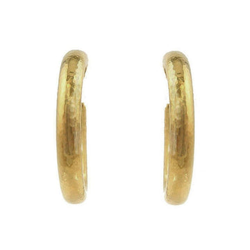 Gold oval hoop earrings with a hammered texture.
