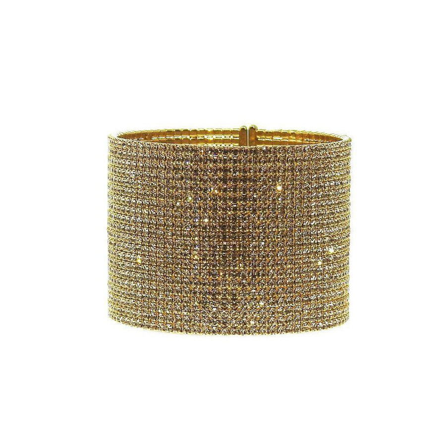Gold pave crystal cuff bracelet, dazzling gold-tone metal base fully encrusted with sparkling crystals.
