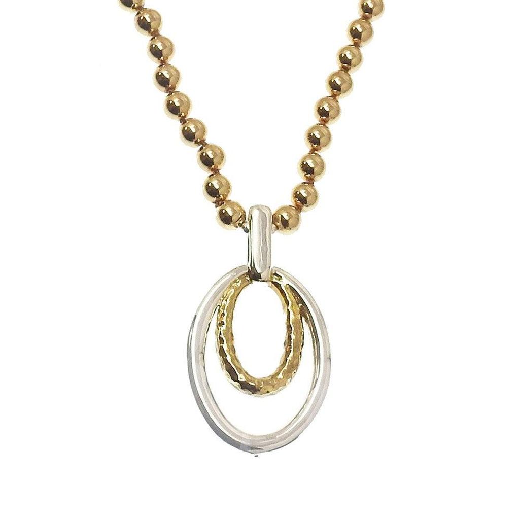 Gold and silver double oval drop necklace with gold bead chain.
