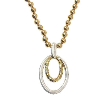 Gold and silver double oval drop necklace with gold bead chain.
