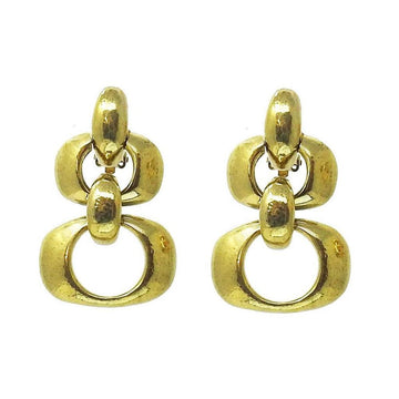 Gold graduated link clip earrings; elegant, statement jewelry.
