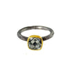 Green Amethyst ring with oxidized silver band and gold bezel setting.
