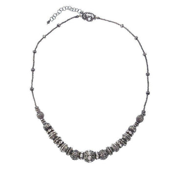 Elegant gunmetal Heishi necklace with sparkling crystal accents.
