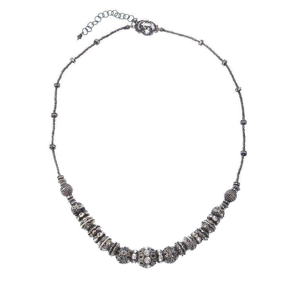 Elegant gunmetal Heishi necklace with sparkling crystal accents.
