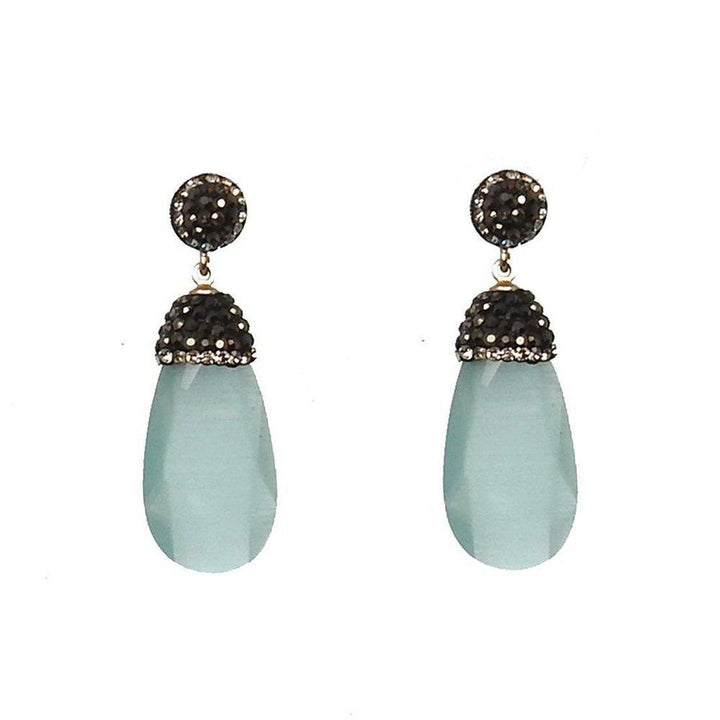 Hematite crystal drop earrings with light blue teardrop stones and black crystal accents.
