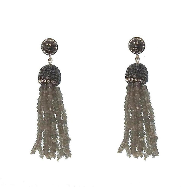 Gray gemstone tassel earrings with dark gray crystal accents.
