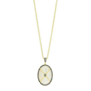 Oval mother-of-pearl pendant necklace with gold chain and diamond accents.
