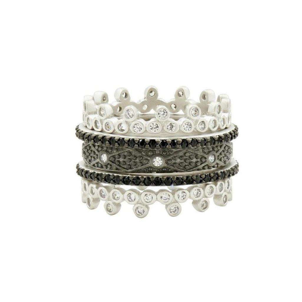 Industrial Finish 5 Ring Stack: Five silver & black rings with sparkling cubic zirconia.
