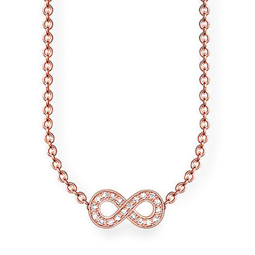 Rose gold infinity necklace with clear cubic zirconia accents.

