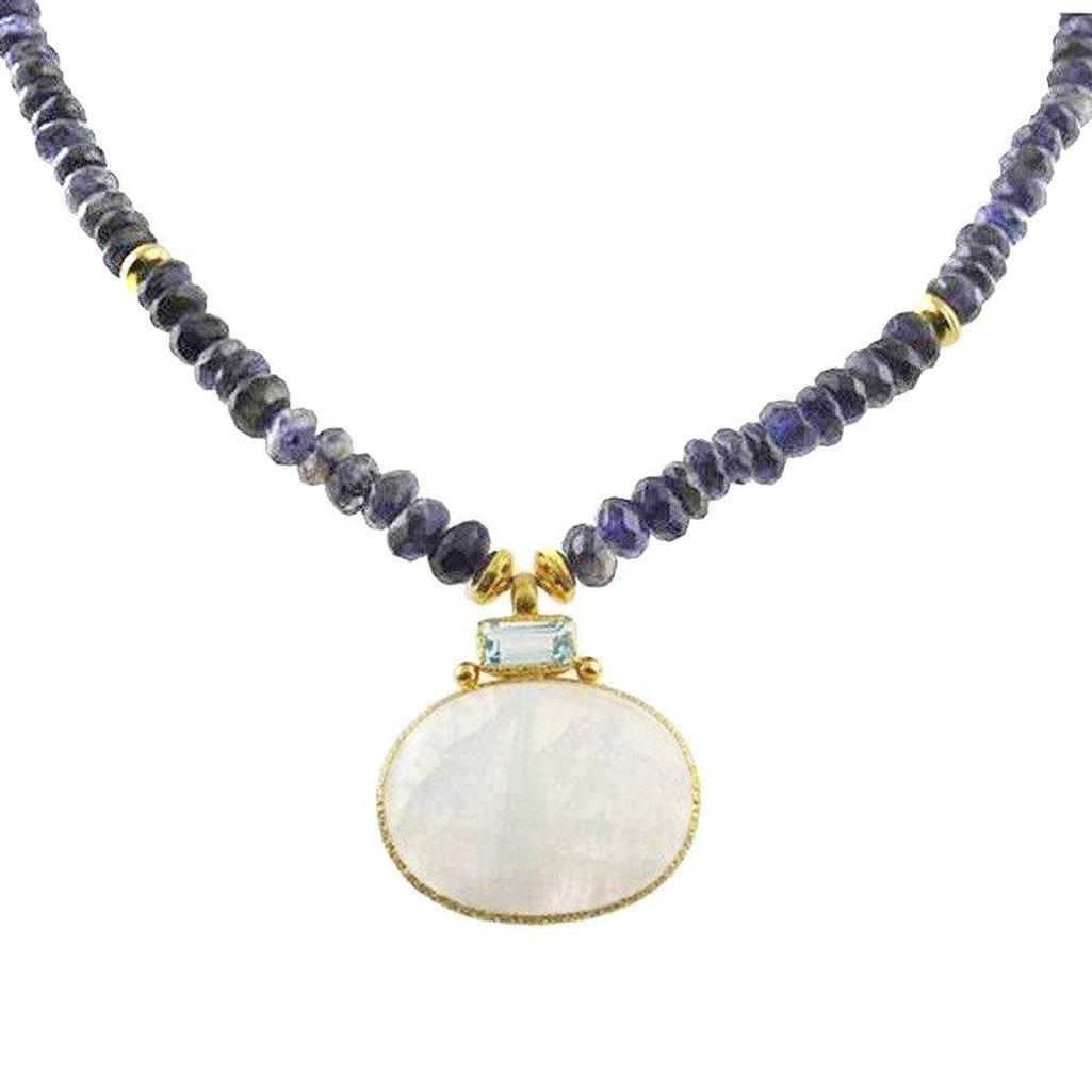 Necklace with purple beads and a white pendant on a white background