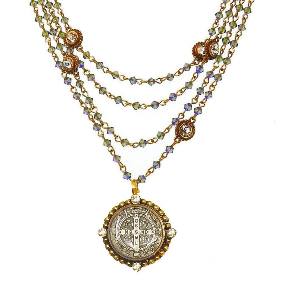 Irridescent Bicone Magdalena necklace: multi-strand, iridescent glass beads, antique gold-tone, St. Jude medal pendant, clear crystal accents.
