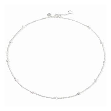 Silver-plated delicate station necklace featuring round bezel-set cubic zirconia crystals on an adjustable chain.
