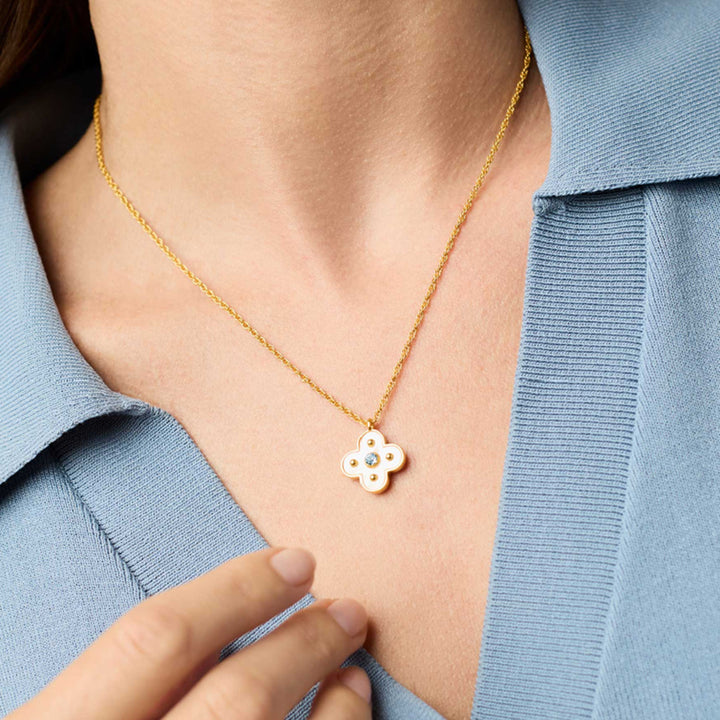 24K gold-plated chain necklace featuring a delicate clover-shaped mother of pearl pendant with a central CZ stone.