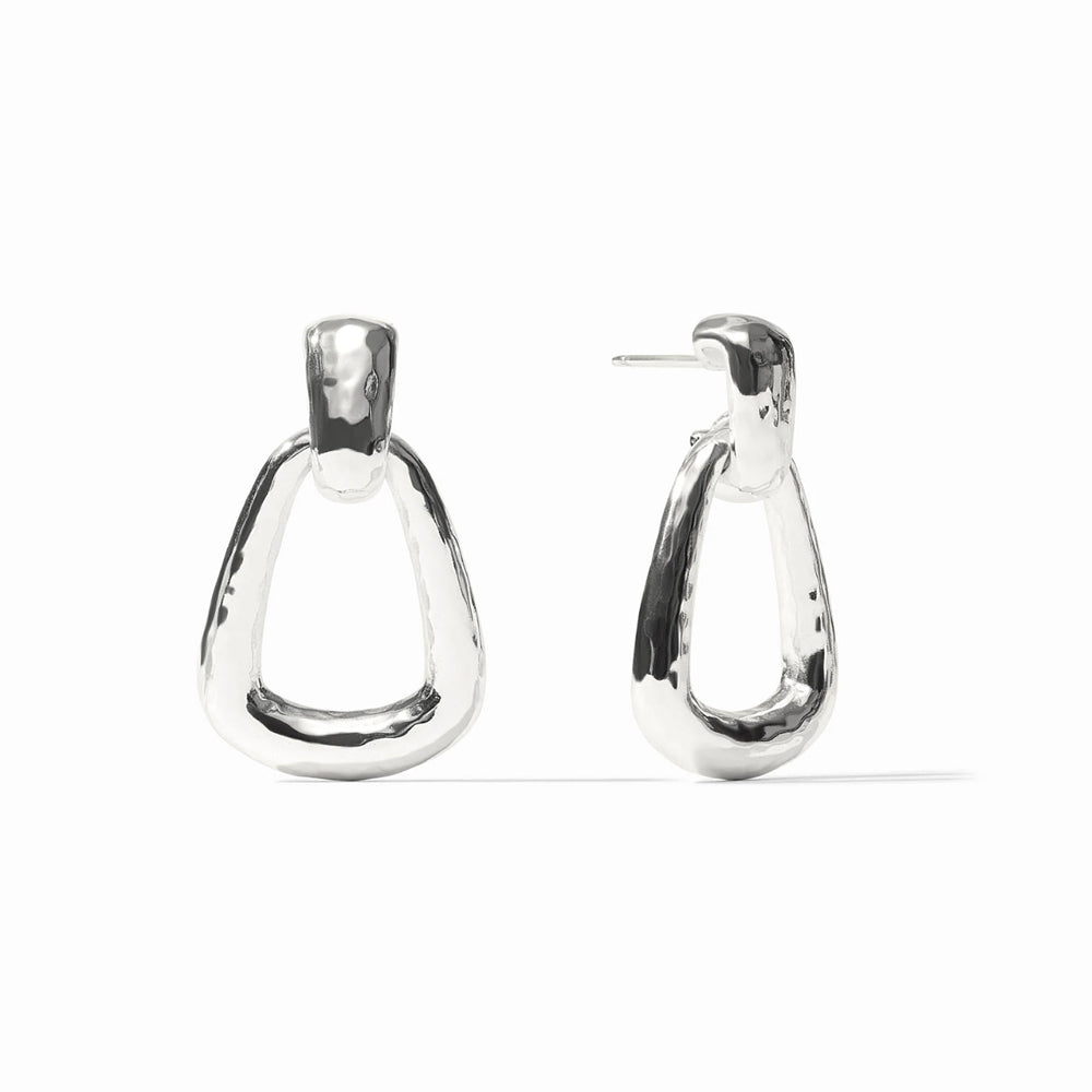 Sahara Demi doorknocker earrings in sterling silver plate with a hammered, triangular drop design and post closure.