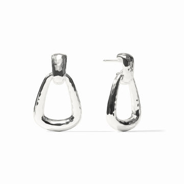 Sahara Demi doorknocker earrings in sterling silver plate with a hammered, triangular drop design and post closure.