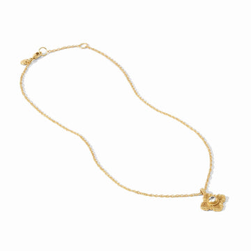 Theodora delicate 24K gold-plated necklace featuring a mother of pearl pendant with a central CZ stone on a slender chain.